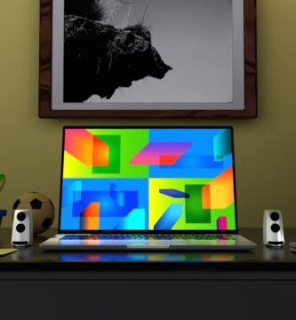 Colorful gaming setup desk with monitor displaying game library interface and RGB lighting - Photo by Alexander Andrews